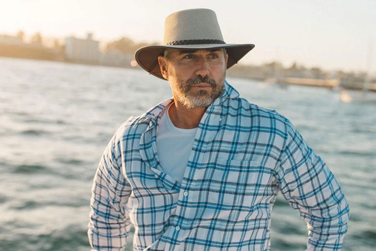 Men wearing a soaker hat for the best fishing hat experience