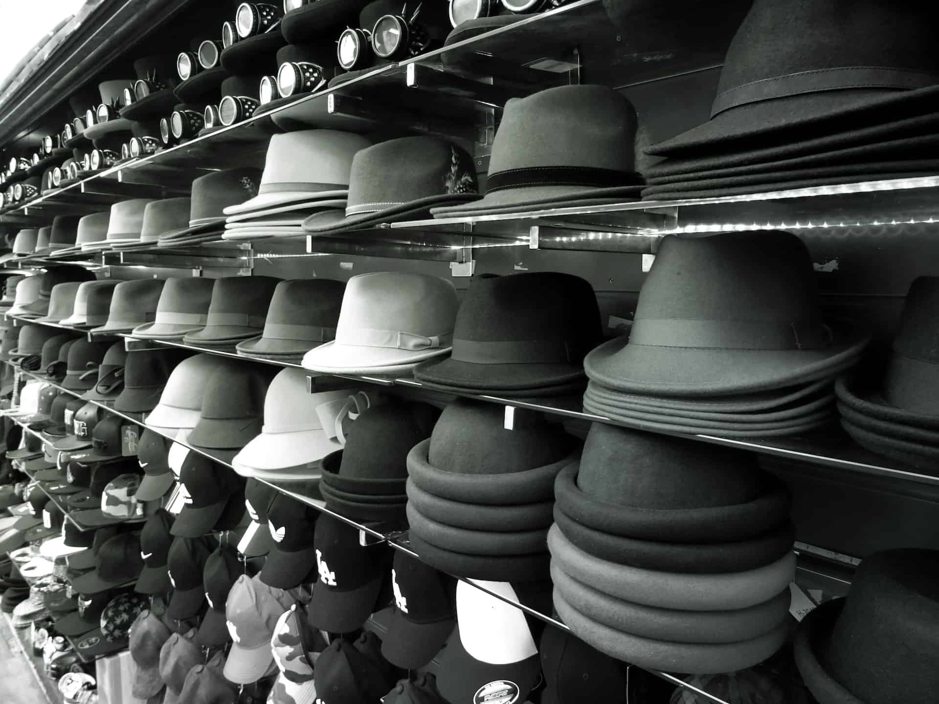 a wall of hats at a store