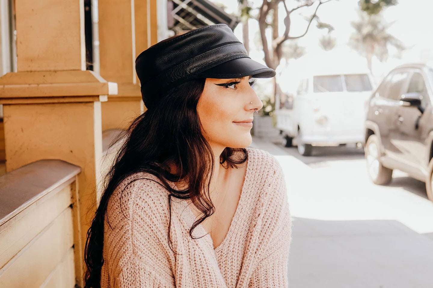 Woman on street with the Bottle Rocker womens cap by American Hat Makers