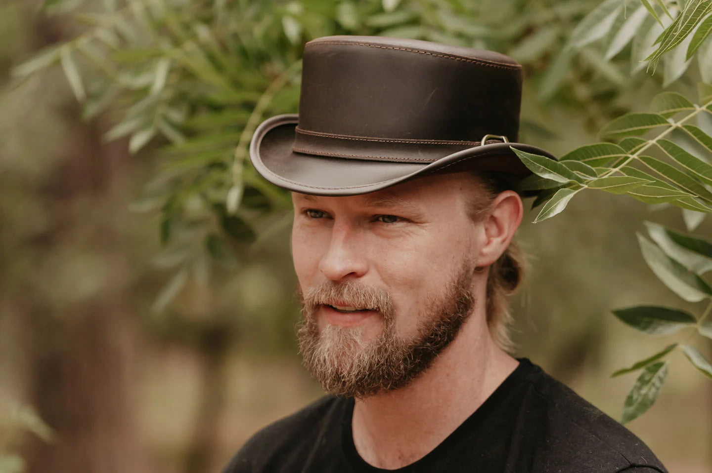 Man in woods wearing the Bromley mens pork pie hat by American Hat Makers