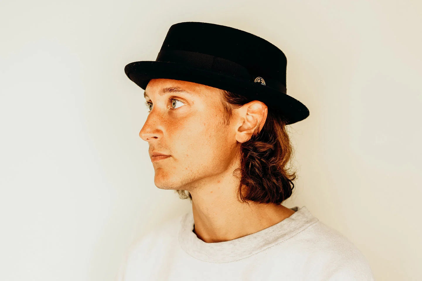 Man posing in the Chi Town mens pork pie hat by American Hat Makers