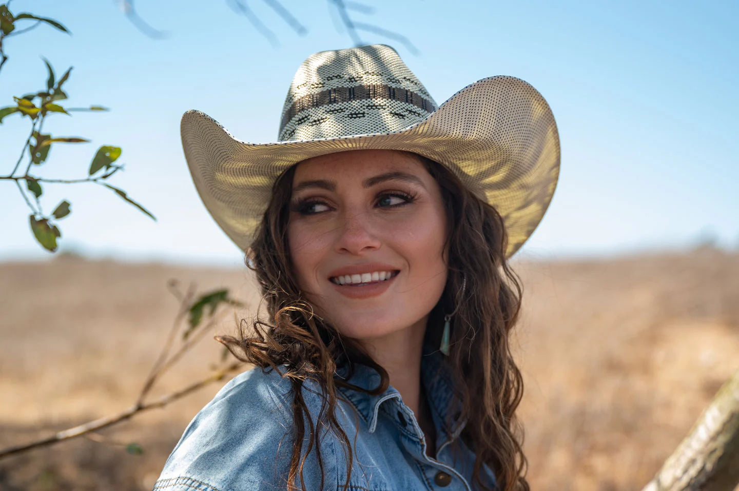 Cowgirl posing with the cisco white cowboy hat by American Hat Makers