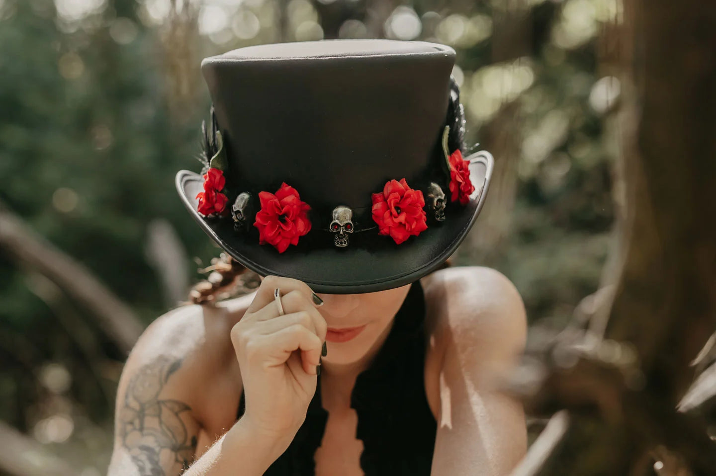 Woman wearing the El Dorado Red Death womens top hat by American Hat Makers