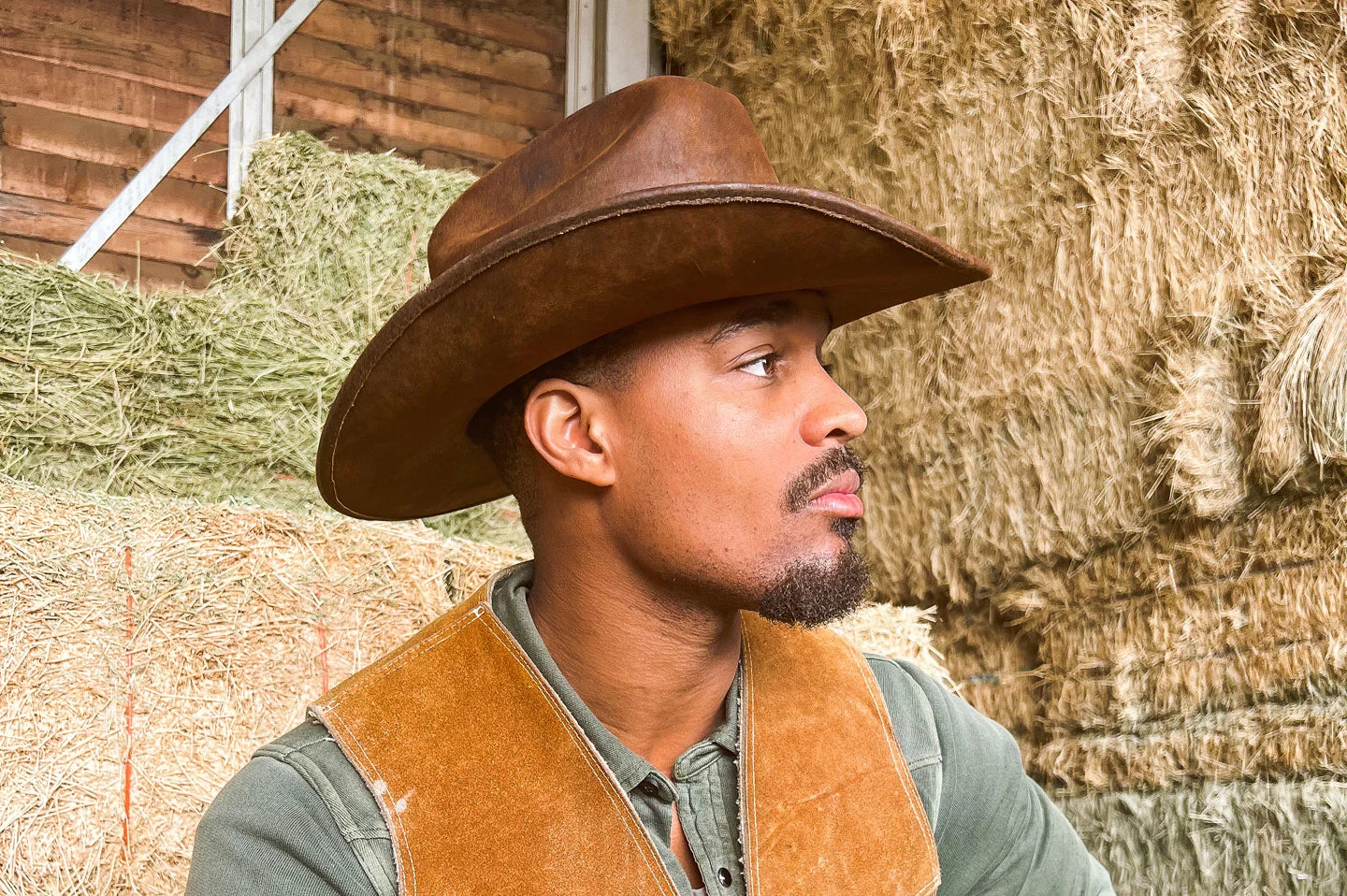 Man sitting in bar wearing the Gorge mens cowboy hat by American Hat Makers