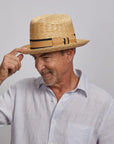 Man tipping his Sawyer Sun Hat slightly