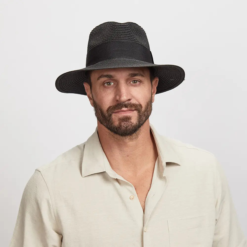 Man wearing a Black Afternoon Sun Hat and a light beige shirt