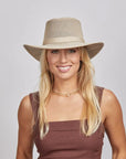 A blonde girl wearing a sleeveless and the Willie Khaki Mesh Sun Hat