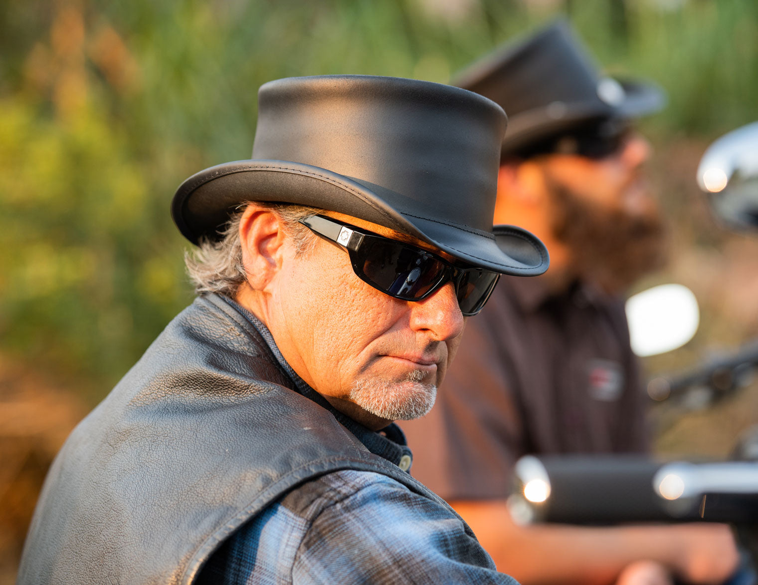 man in flannel wearing a marlow black top hat from american hat makers