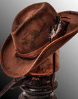 An angled view of a Duke Brown Felt Cowboy Hat placed on a stand