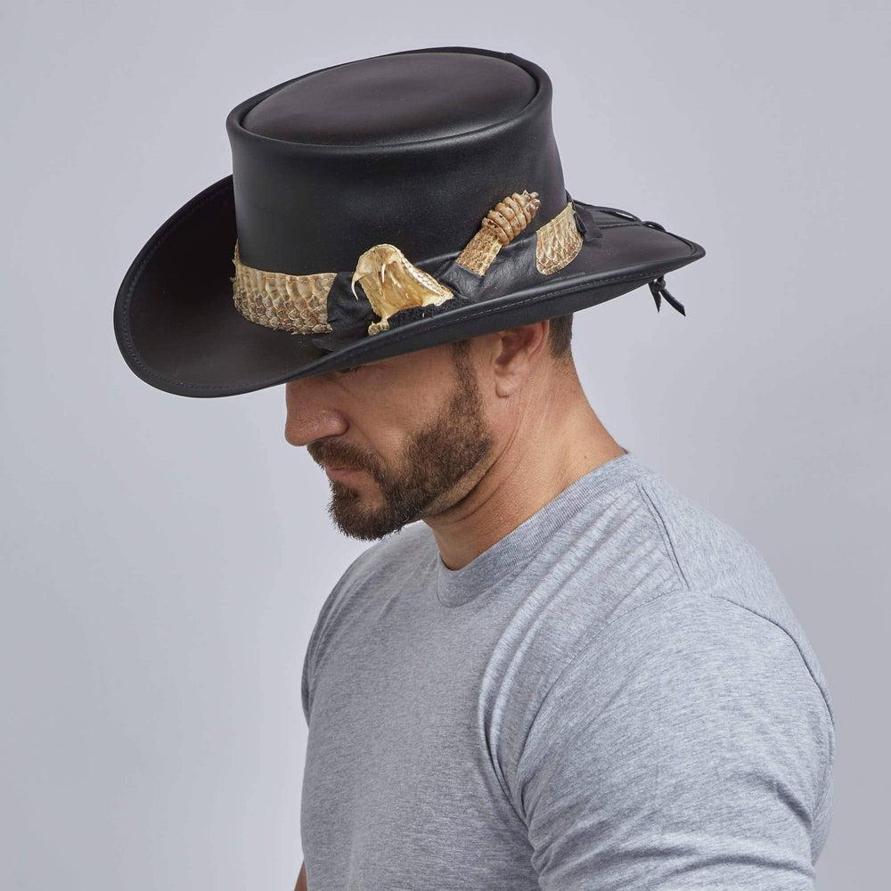 A man wearing Pale Rider Black Finished Top Hat with Rattlesnake Band on a side view