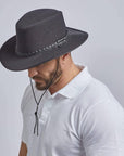 A man wearing Soaker Black Mesh Sun Hat