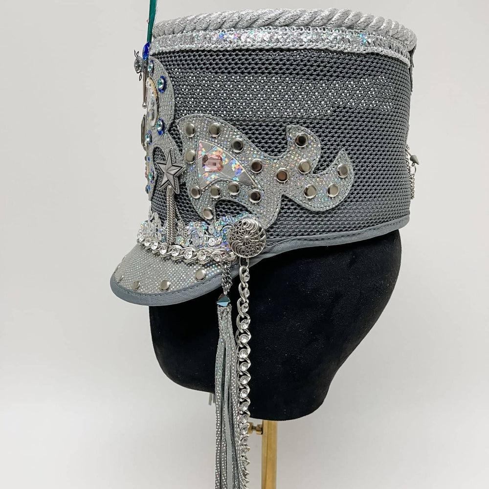 A stargazer hat on a side view placed on a stand