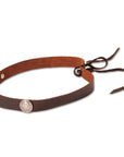 An angle view of a Buffalo Brown Leather Band with Replica Buffalo Nickels