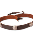 A front view of a Buffalo Brown Leather Band with Replica Buffalo Nickels