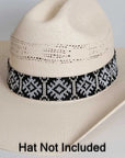 An Angle left view of a white cowboy hat with carson black and white beaded hat band