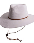 A side view of Felix white straw sun hat with chinstrap