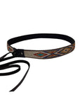 An angle view of a native american hat band