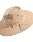 An angled view of Lena natural straw sun hat 