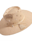 An angled view of Lena natural straw sun hat