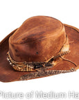A Side view of a  sidewinder brown hat