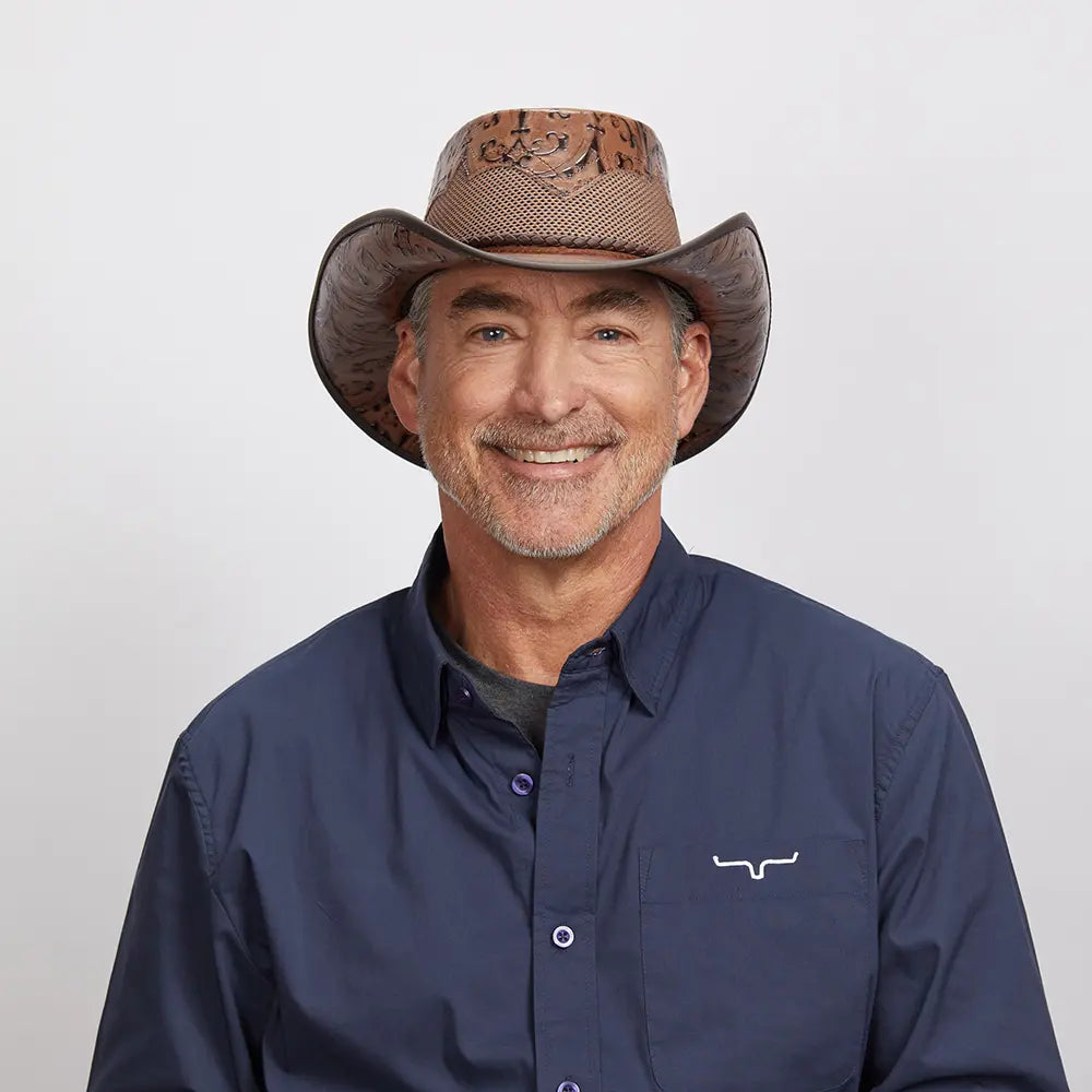 Middle-aged man wearing a Sierra Brown Cowboy Hat and a dark blue shirt