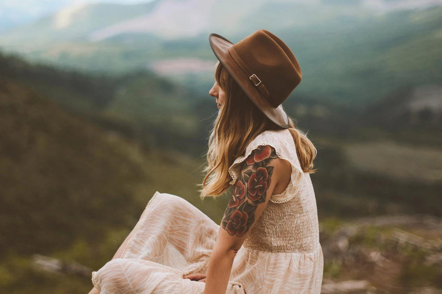 Woman in the hills wearing the Summit australian outback hat by American Hat Makers