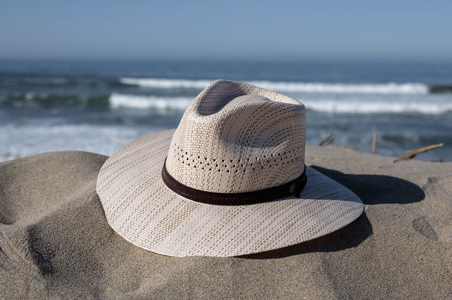 Barcelona sun hat by American hat Makers on beach