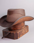 Durango Chocolate Leather Mesh Cowboy Hat by American Hat Makers on a stand