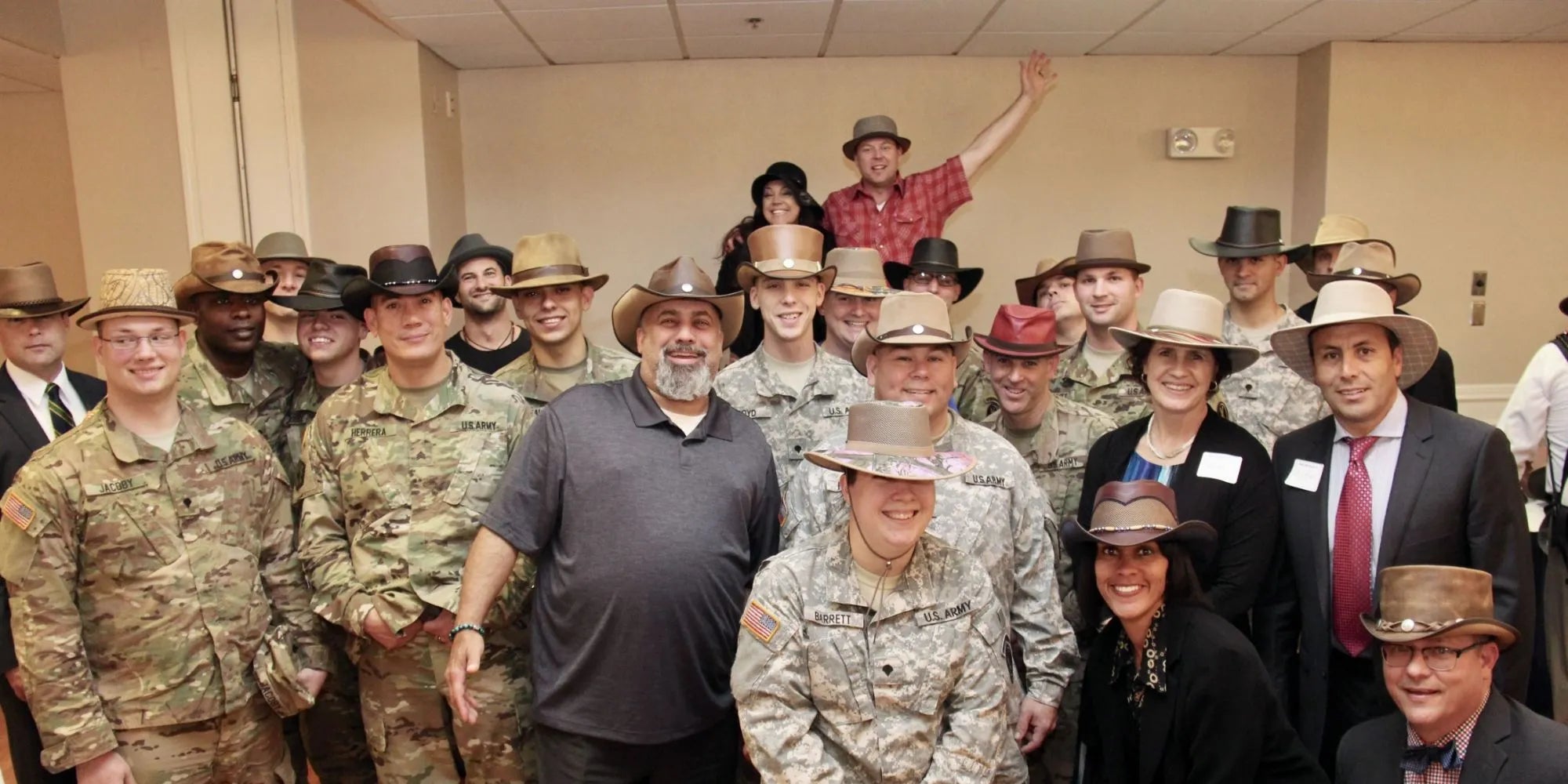 A group of American soldiers wearing different kinds of hats
