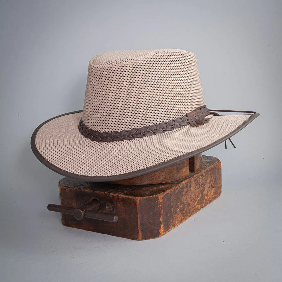 An angled view mesh sun hat placed on a stand