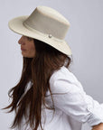 A woman wearing Cabana Ivory Mesh Sun Hat 