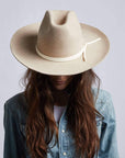A woman wearing Crescent Oatmeal Felt Wool Fedora Hat on a front view