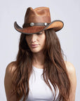A woman wearing Cobblestone Leather Cowboy Hat on an angle view