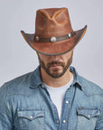 A man in denim jacket wearing Cyclone Cobblestone Leather Cowboy Hat with 3" Brim and 4" Crown 
