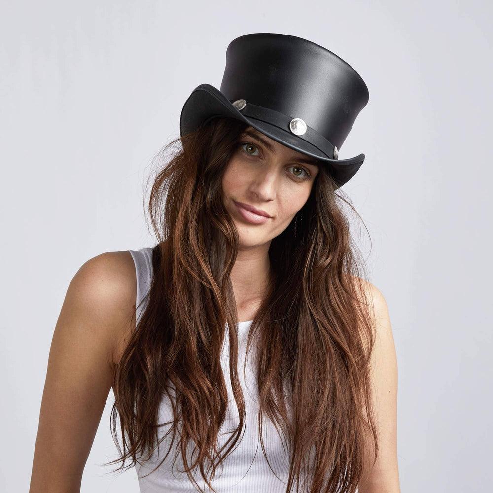 A woman in white tops wearing Black Leather Top Hat