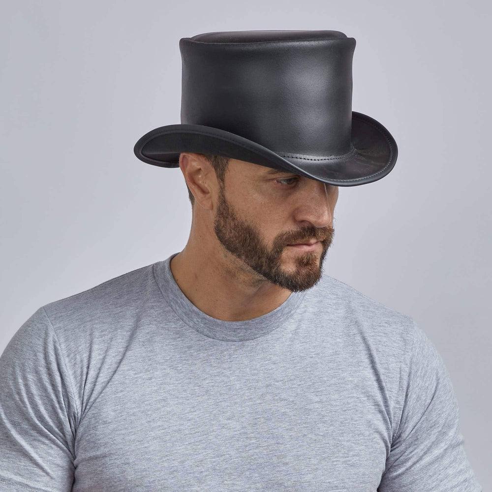 A man wearing Unbanded El Dorado Black Leather Top Hat on aside view
