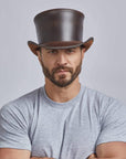 A man wearing Unbanded El Dorado Brown Leather Top Hat