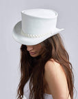 A woman wearing Ghost Rider White Top Hat on an angle view 