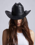 A woman wearing Gorge Leather Cattleman Black Cowboy Hat 