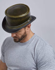 A man wearing Hampton London Green Leather Top Hat 