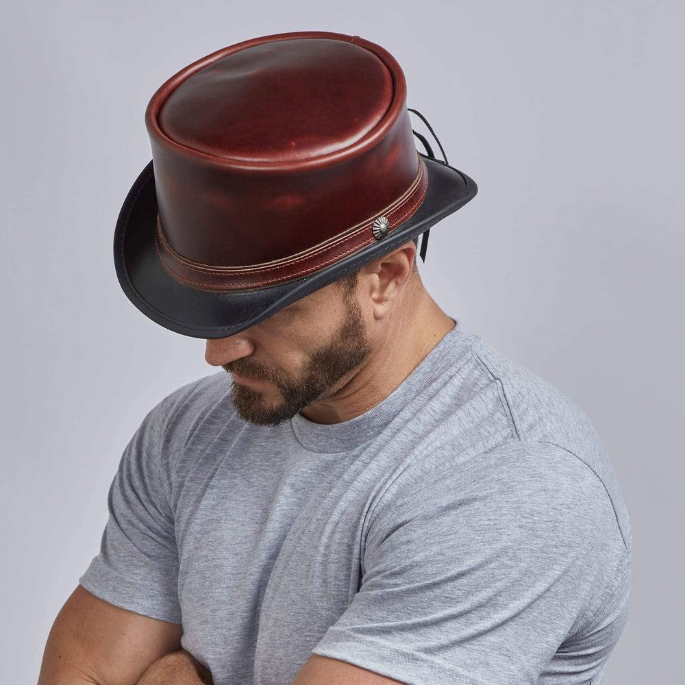 A man wearing Hampton Napa Vino Leather Top Hat 