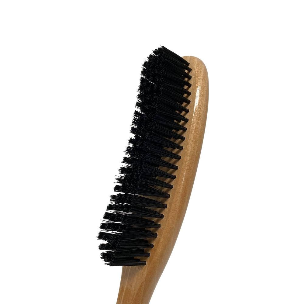 A side view of a Hat Brush