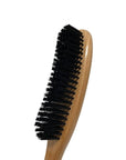 A side view of a Hat Brush