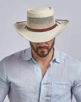 A man wearing Madrid Cream Straw Pork Pie Sun Hat on a front view