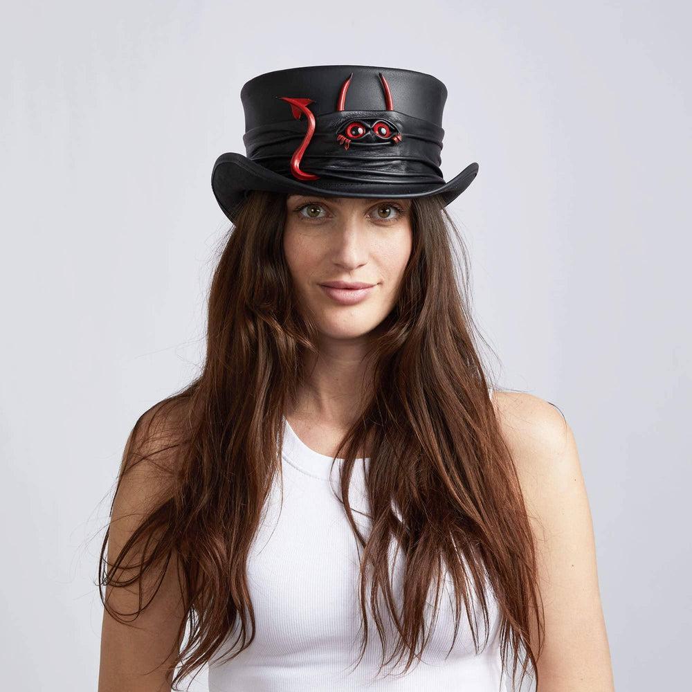 A woman wearing Lil Evil Black Leather Top Hat