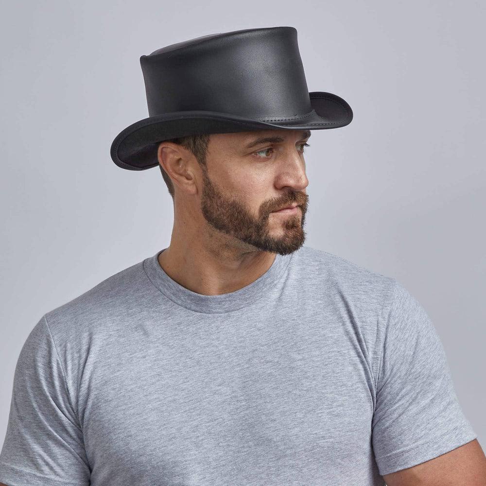 A man wearing Unbanded Black Marlow Top Hat 