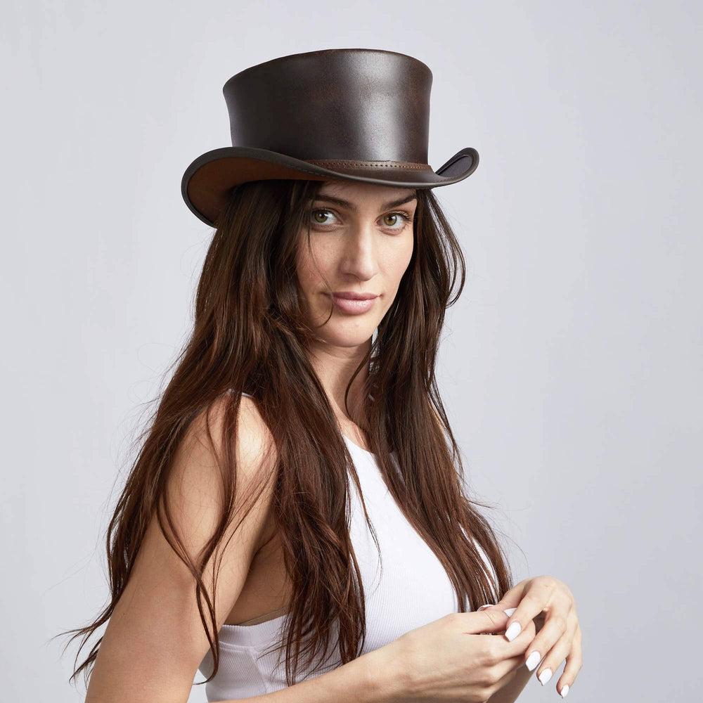 A woman wearing Unbanded Marlow Brown Finished Top Hat facing front
