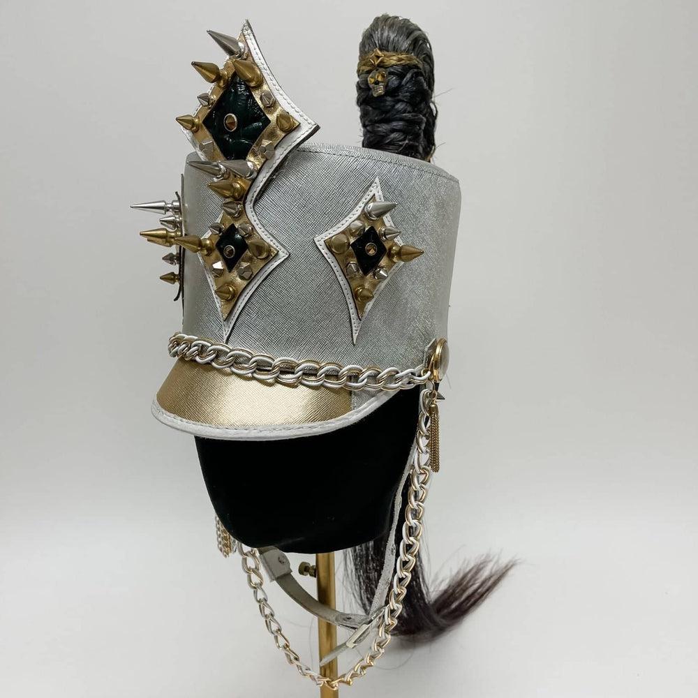 A mcqueen guard hat on an angle view