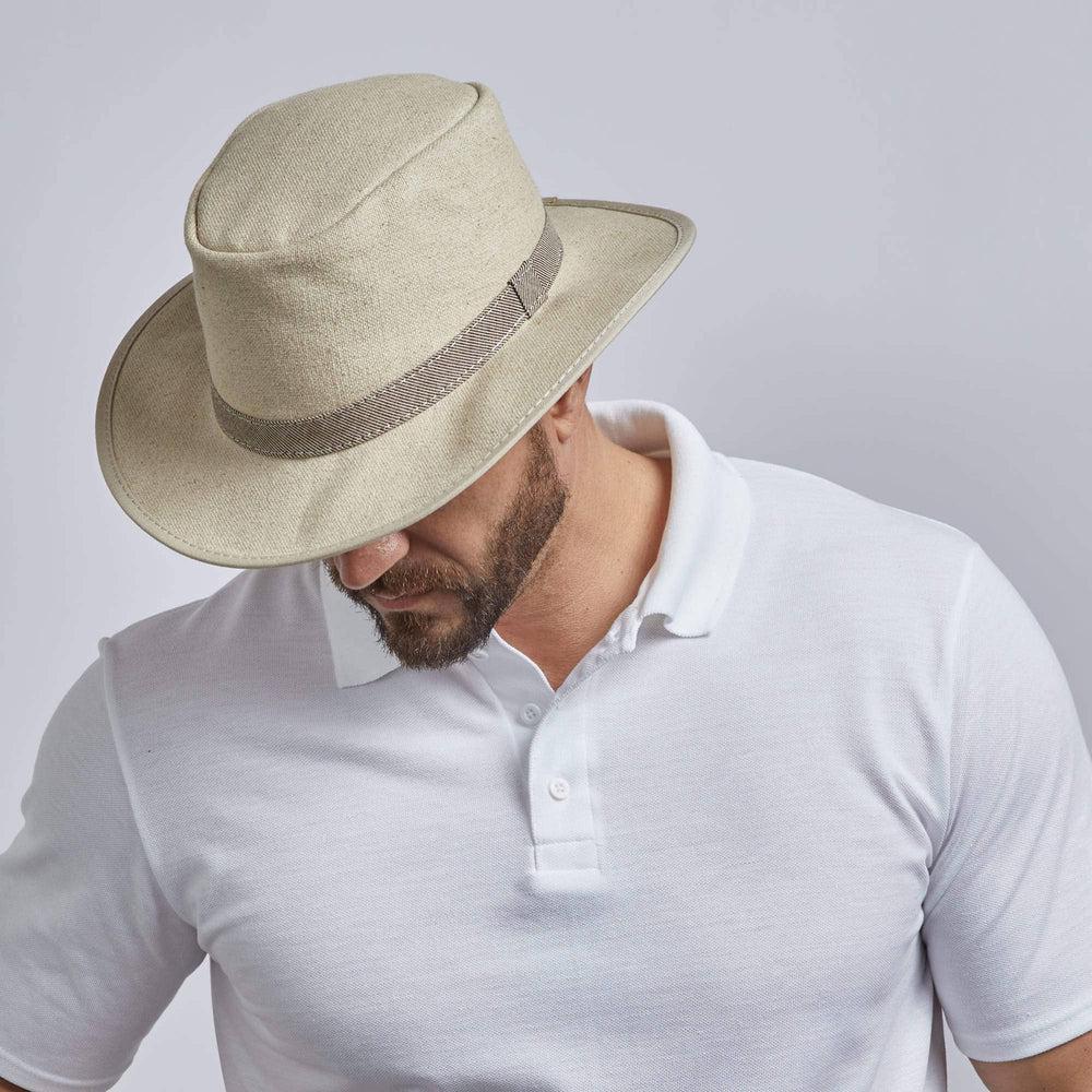A man wearing Rogan Hemp Fabric Khaki Sun Hat