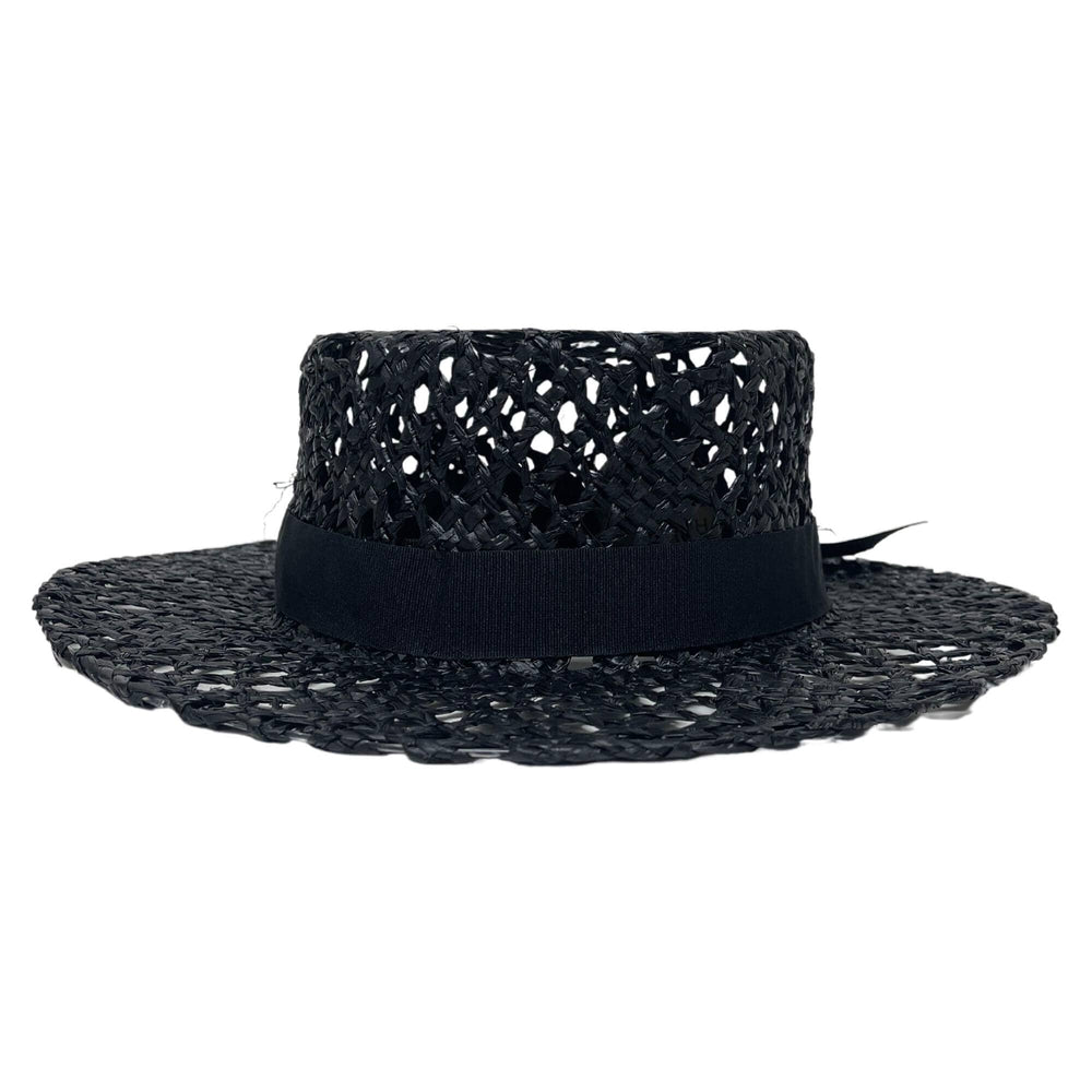 An angle view of Saunter Black Straw Sun Hat 
